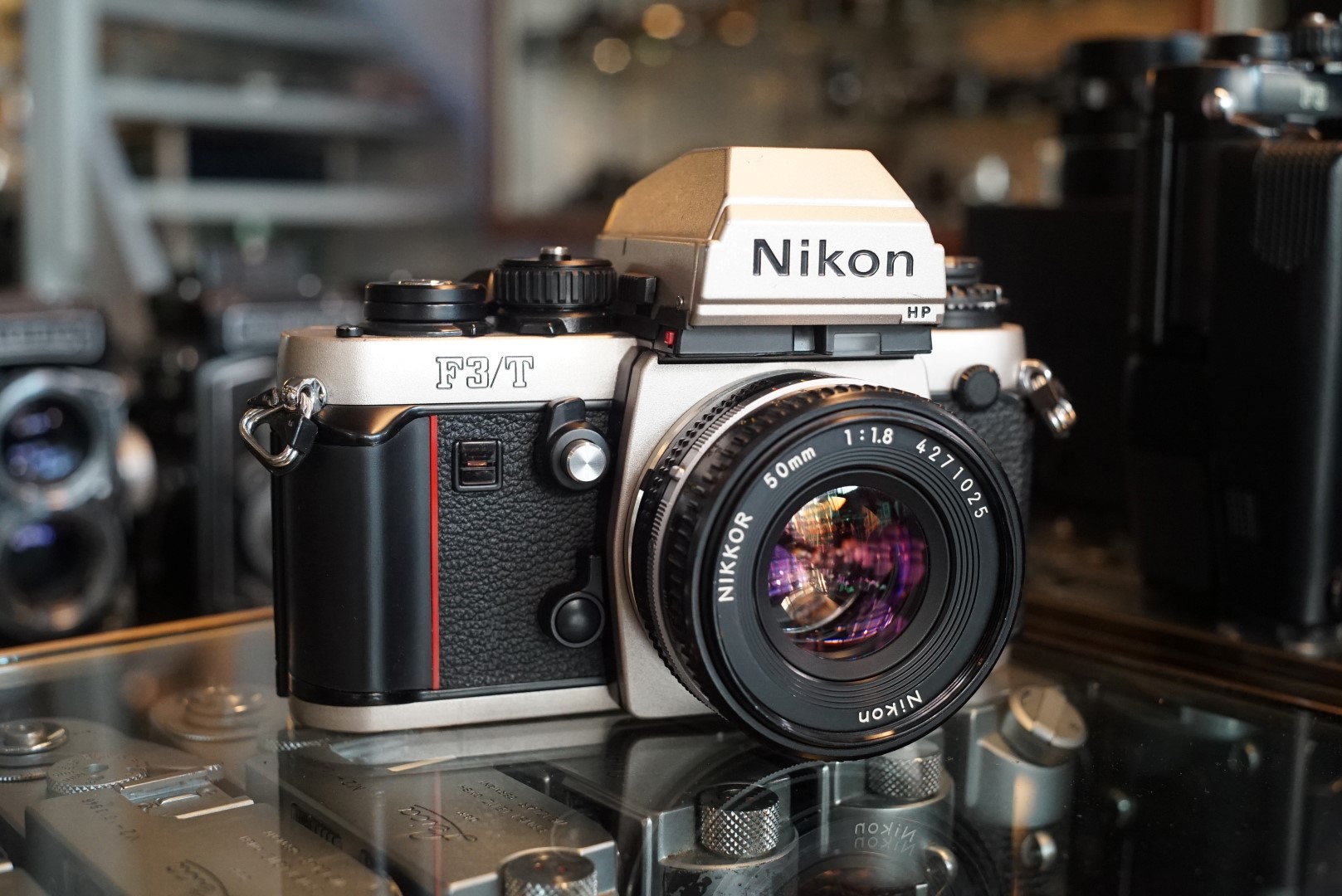 Nikon F3/T HP + Nikkor 50mm f/1.8 AIS - Fotohandel Delfshaven / MK