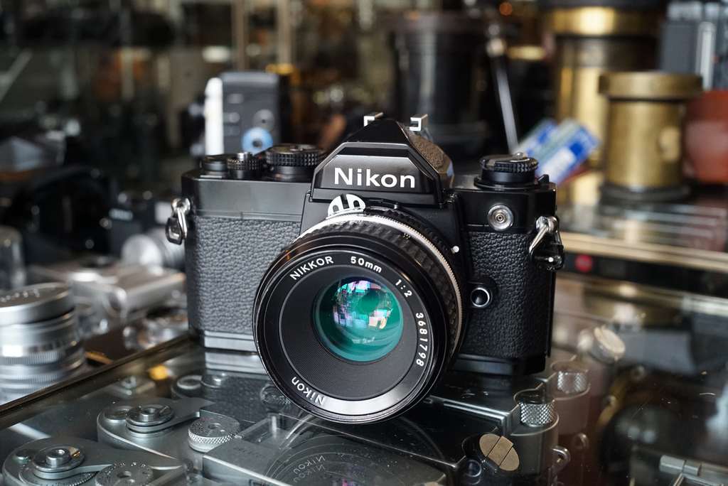 Nikon FM Black + Nikkor 50mm 1:2 AI-S - Fotohandel Delfshaven / MK