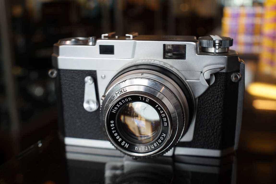 Konica camera with Hexanon 1:2 / 50mm, OUTLET - Fotohandel Delfshaven / MK Optics