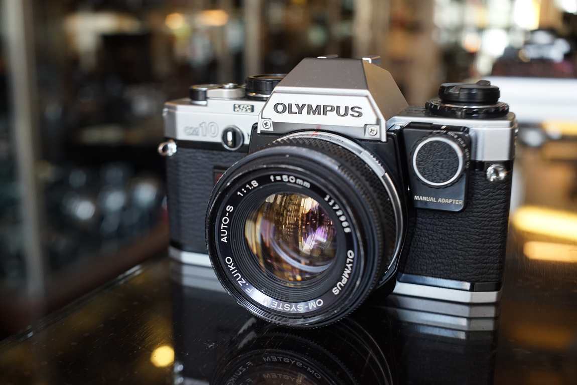 Olympus OM-10 50mm F/1.8 and manual adapter Fotohandel Delfshaven MK  Optics